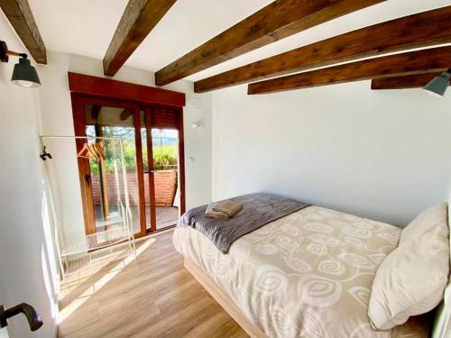 Postel nebo postele na pokoji v ubytování Apartamentos via street 3000