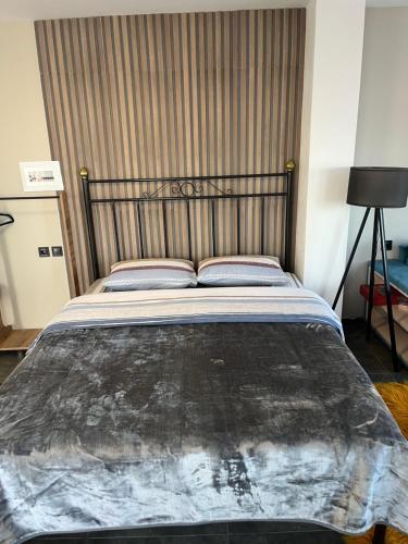 a large bed in a room with at ElatoVillage in Elatochori