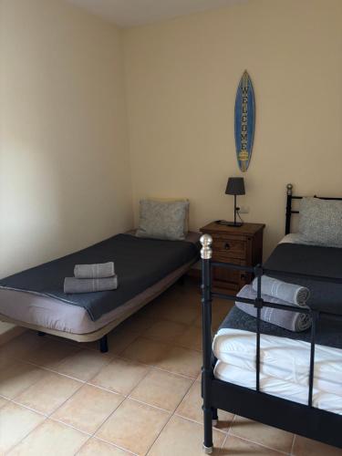 A bed or beds in a room at Casa Mía