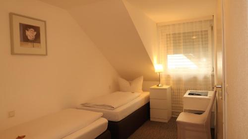 Postel nebo postele na pokoji v ubytování Hotel Zur Kripp