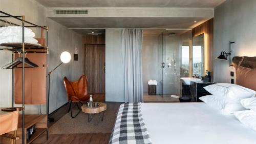 Ένα ή περισσότερα κρεβάτια σε δωμάτιο στο Puro Dão Hotel & Spa