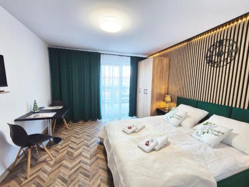 Posteľ alebo postele v izbe v ubytovaní Apartament 38 i 37 Okrzei 1c