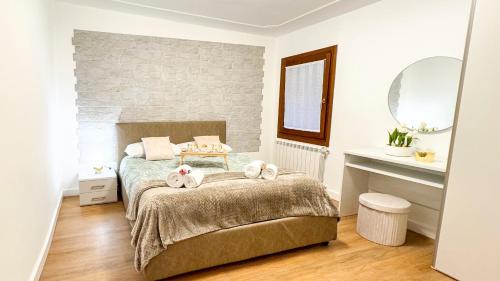 Una cama o camas en una habitación de C'ali by Ca-Sa Check