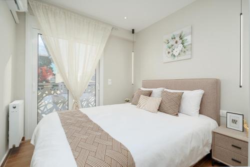 Ένα ή περισσότερα κρεβάτια σε δωμάτιο στο Brand New Building Deluxe Apartments With Parking Nearby Train