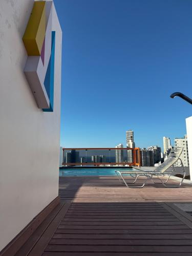 a view of the city from the roof of a building at Flat Mobiliado na Barra in Salvador