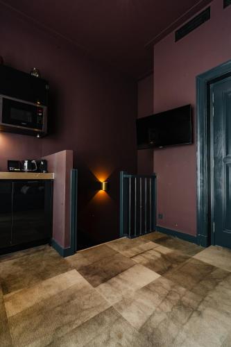 Η κουζίνα ή μικρή κουζίνα στο De Jonker Urban Suites