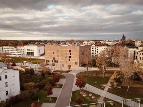 an aerial view of a city with buildings at Lözius 7 in Halle an der Saale