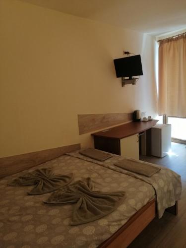 Ένα ή περισσότερα κρεβάτια σε δωμάτιο στο Complex Maxim - sea view and free parking