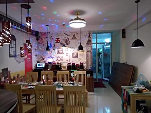 Coin salon dans l'établissement Friendly Home Hotel