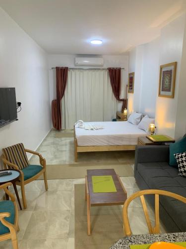 Ένα ή περισσότερα κρεβάτια σε δωμάτιο στο Quiet quarter and private beach
