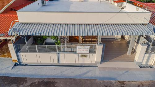 an overhead view of a building with a sign on it at UDUPI HOMESTAY - Hill Top Villa in Udupi