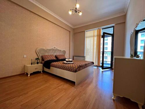 Llit o llits en una habitació de Standard Apartment Residence