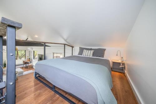 a bedroom with a large bed in a room at Texas Retreat - Sunset Rock in Wimberley