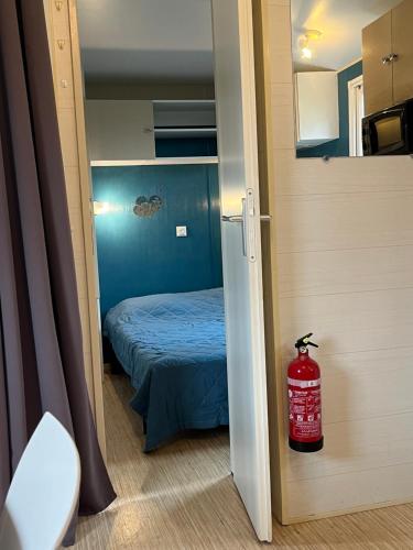 Postel nebo postele na pokoji v ubytování Mobile home