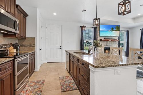 a kitchen with a large island with a counter top at Pampered Pillow in Canyon Lake