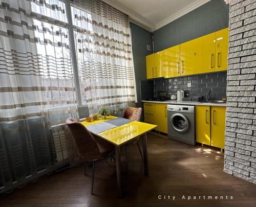 Køkken eller tekøkken på Yellow Boulevard Apartment