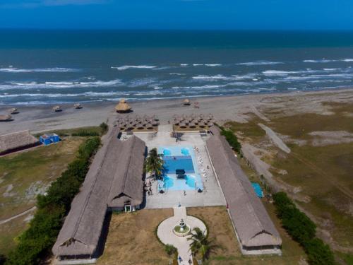 an aerial view of a resort and the ocean at Hotel Arena Beach Cartagena in Cartagena de Indias