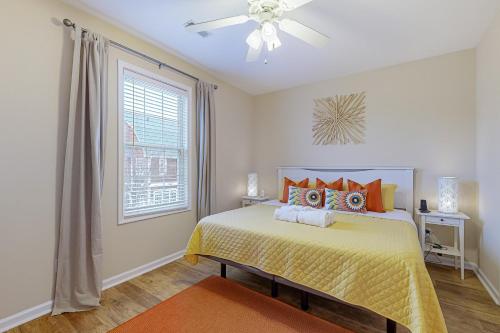 a bedroom with a bed and a ceiling fan at Creekwood --- 1400 Pebble Dr #1410 in The Plantations