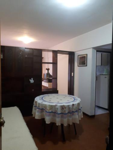 a room with a table in the middle of a room at Susana in Mar del Plata