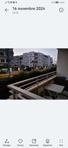 two pictures of a city with buildings in the background at Résidences Mansbay Jasmin in Mansouria