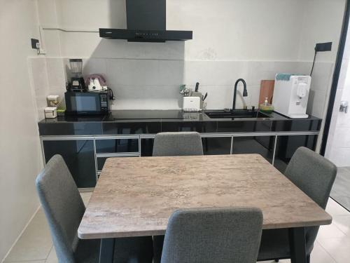 Billede fra billedgalleriet på RINA HOMESTAY Kemaman i Cukai