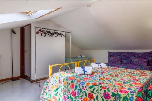 En eller flere senge i et værelse på On the notes of the sea