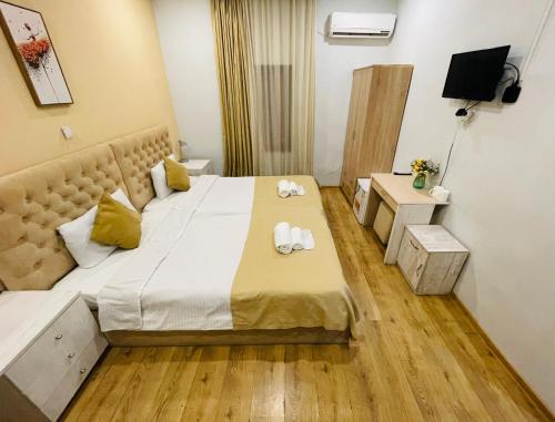 TV a/nebo společenská místnost v ubytování Hotel Art Green