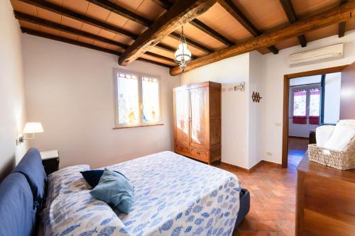 Katil atau katil-katil dalam bilik di Agriturismo Cupido