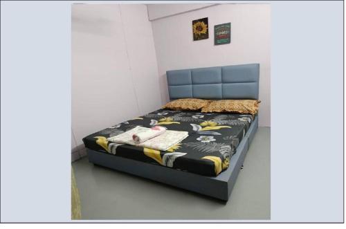 Katil atau katil-katil dalam bilik di HOMESTAY BUDGET ALOR SETAR