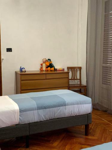 Ένα ή περισσότερα κρεβάτια σε δωμάτιο στο La Vecchia Barriera - Appartamento