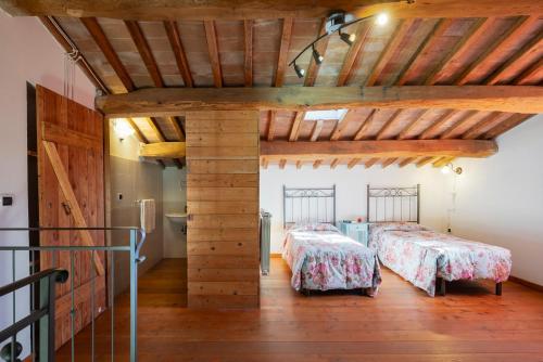 Postel nebo postele na pokoji v ubytování Relais Il Ciliegio