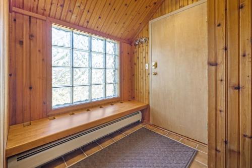 a sauna with a window and a bench in a room at Stratton's Crown Point Mountain Views, Top Floor newlly furnished in Stratton