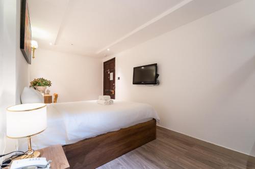 TV a/nebo společenská místnost v ubytování Thuan Phat Hostel