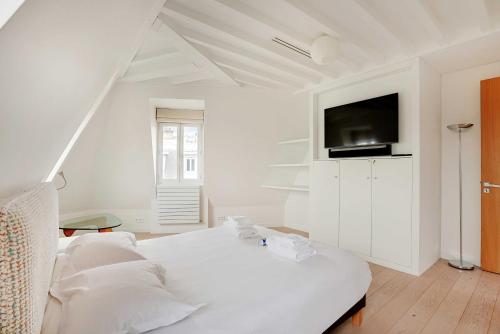 Photo de la galerie de l'établissement Designer Loft - 2BD-6P- Arc de Triomphe, à Paris