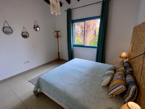 Katil atau katil-katil dalam bilik di Seaside Two Bedroom Cosy Townhouse in Tourist Area