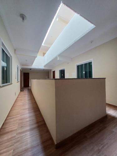 an empty room with a skylight in the ceiling at Pousada Estrela Mares Suíte 204 in Cabo Frio