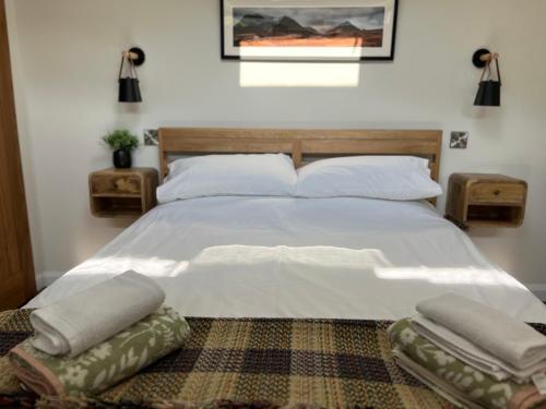 Katil atau katil-katil dalam bilik di Cabin in Eaves Wood