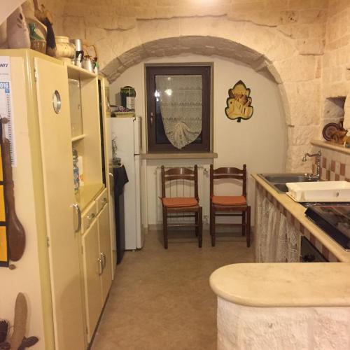 Kuchyň nebo kuchyňský kout v ubytování B&B Villa Grassi