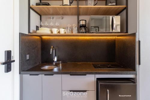 Una cocina o zona de cocina en Spot Jurere sofisticación junto al mar - SPJ's