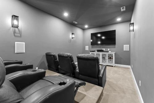 a waiting room with chairs and a flat screen tv at Lake Escape by AvantStay Lakefront Private Dock in Mooresville