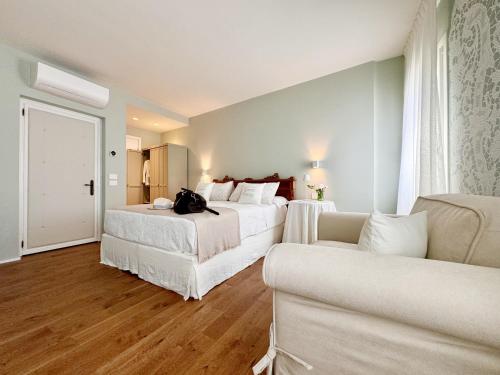 Ένα ή περισσότερα κρεβάτια σε δωμάτιο στο B&B Carmen Garden