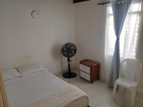 Katil atau katil-katil dalam bilik di Road Living Home