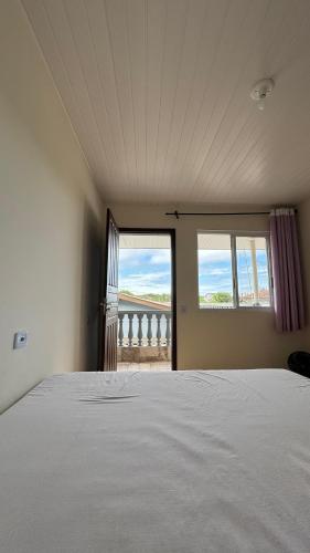 Postel nebo postele na pokoji v ubytování Casa Matinhos 9