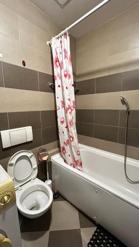 Ett badrum på Sunrise apartment