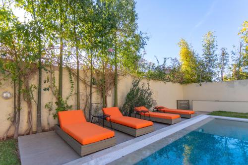 Πισίνα στο ή κοντά στο Villa 5 Suites Moderne