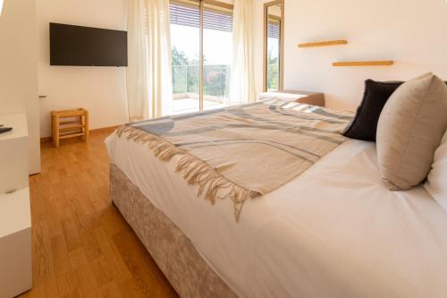 Ένα ή περισσότερα κρεβάτια σε δωμάτιο στο Villa 5 Suites Moderne
