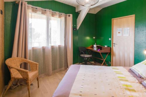 Postel nebo postele na pokoji v ubytování Homgaïa chambres d'hôtes