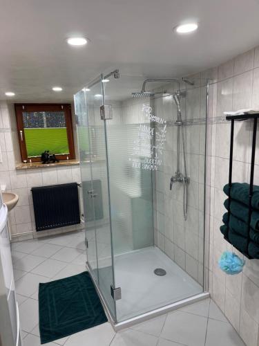 Ένα μπάνιο στο Ferienwohnung - Hotzenhüsli