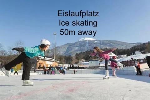 a group of children skateboarding in a skate park at Hotel Gruberhof Innsbruck Igls B&B in Innsbruck