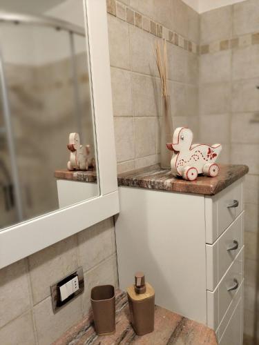 a bathroom with a shower and a counter with a sink at Casa Elvezia in Breuil-Cervinia